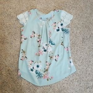 Woman's medium floral blouse